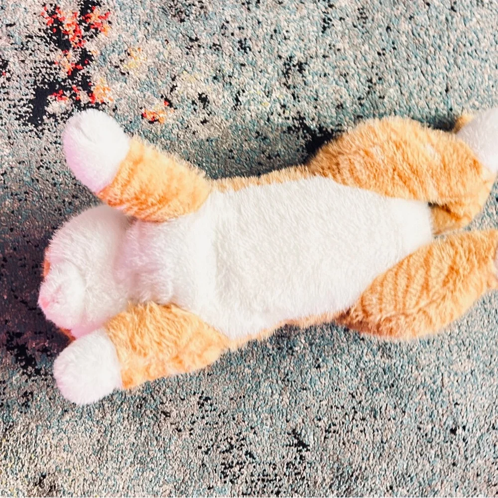 Weighted, life size Plush Cat Toy - Orange and White.  Like new condition